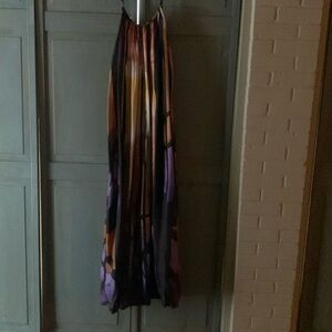 Patterned maxi dress with adjustable straps.